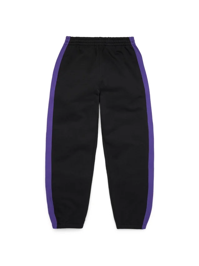 Pantalon de survêtement à ourlet ouvert « DT Stripe » noir