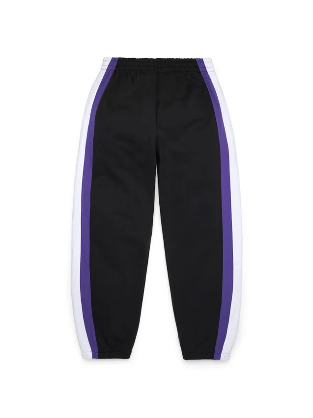 Pantalon de survêtement à ourlet ouvert « DT Stripe » noir