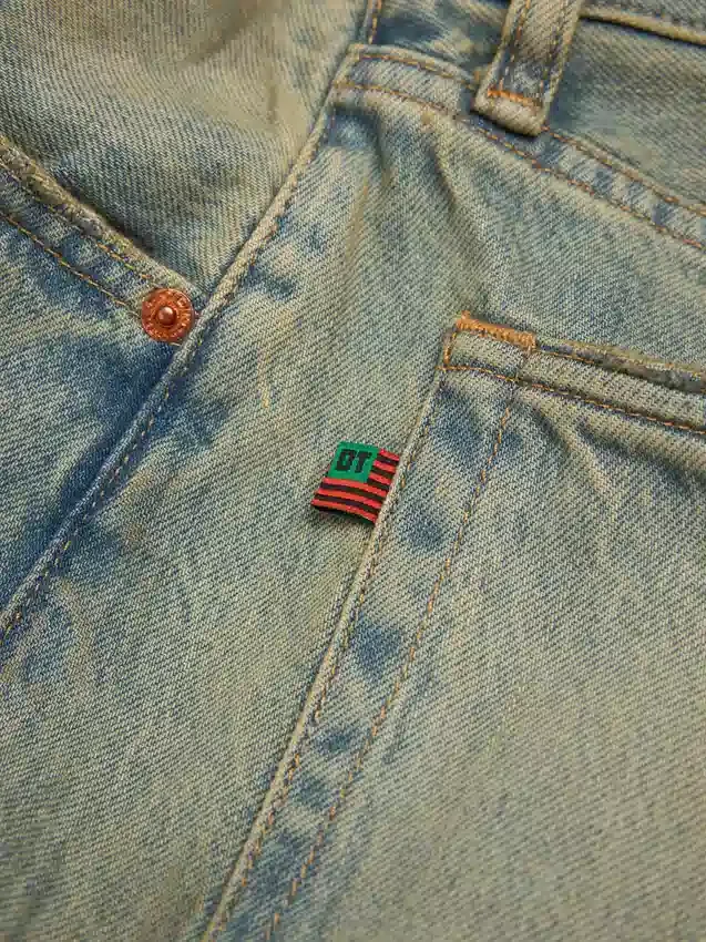 Pantalon en Denim ample, délavage sale