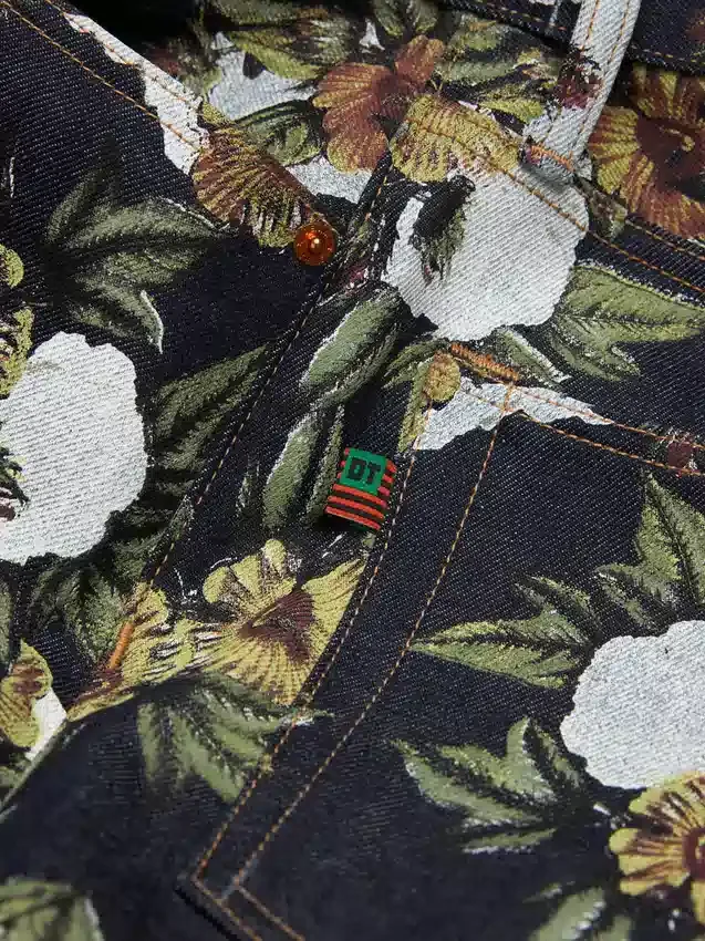 Pantalon en denim à fleurs ample avec lisière