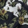 Pantalon en denim à fleurs ample avec lisière