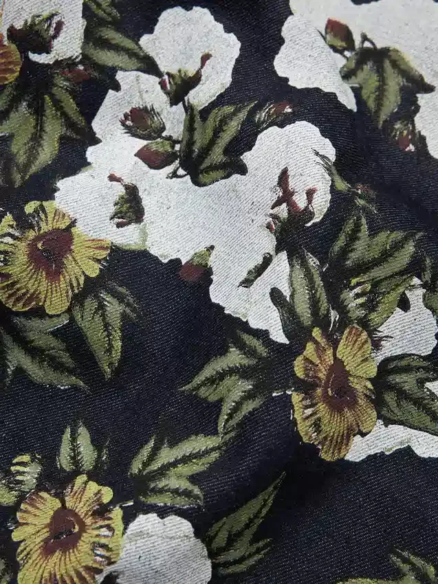 Pantalon en denim à fleurs ample avec lisière