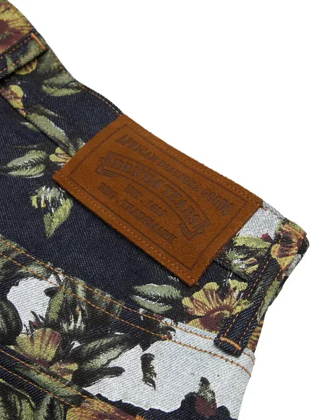 Pantalon en denim à fleurs ample avec lisière