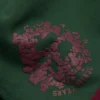 Short de survêtement en denim à empiècements « U » vert
