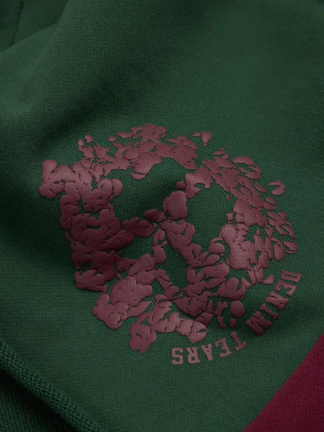 Short de survêtement en denim à empiècements « U » vert
