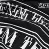 T-shirt noir à imprimé bannière ADG